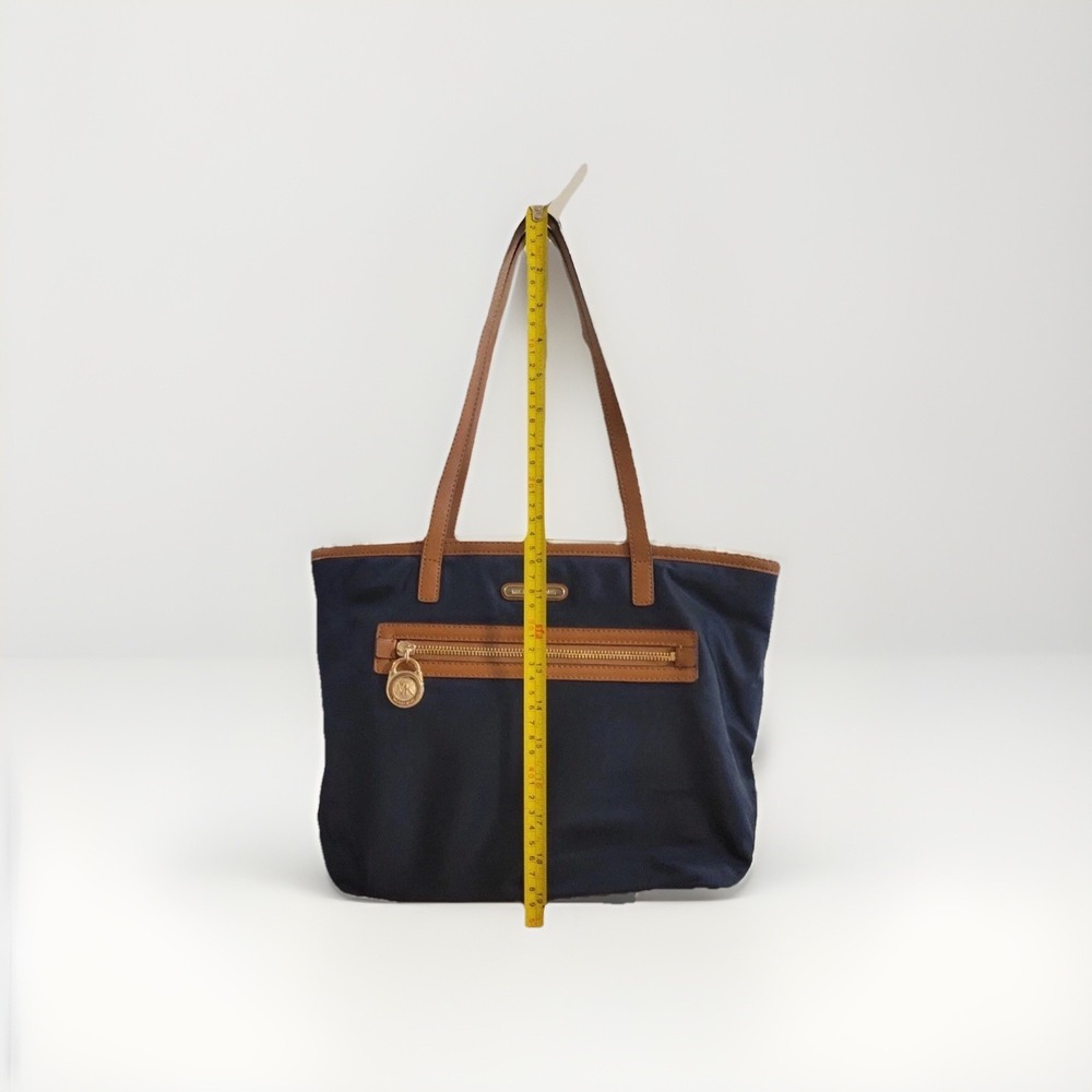 Michael Kors Kempton Lg East West Tote-Navy Blue w/Brown Leather Trim, Gold MK - Picture 12 of 14